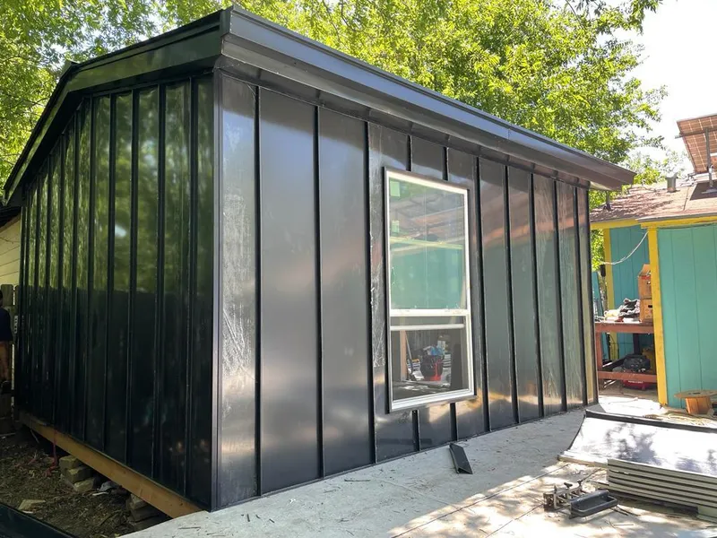 Black standing seam metal wall panels for Roof Inspection in West Covina